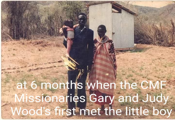 Six-month-old Daniel ole Koitatoi being held by his parents, James ole Ntuma and Anna